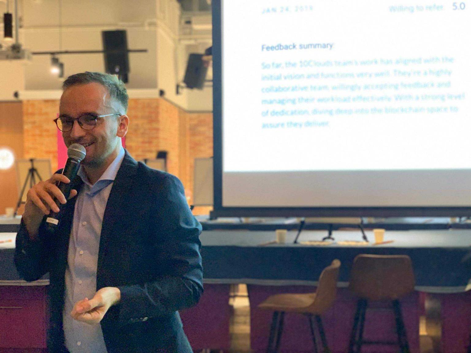 Maciej presenting at 10Clouds